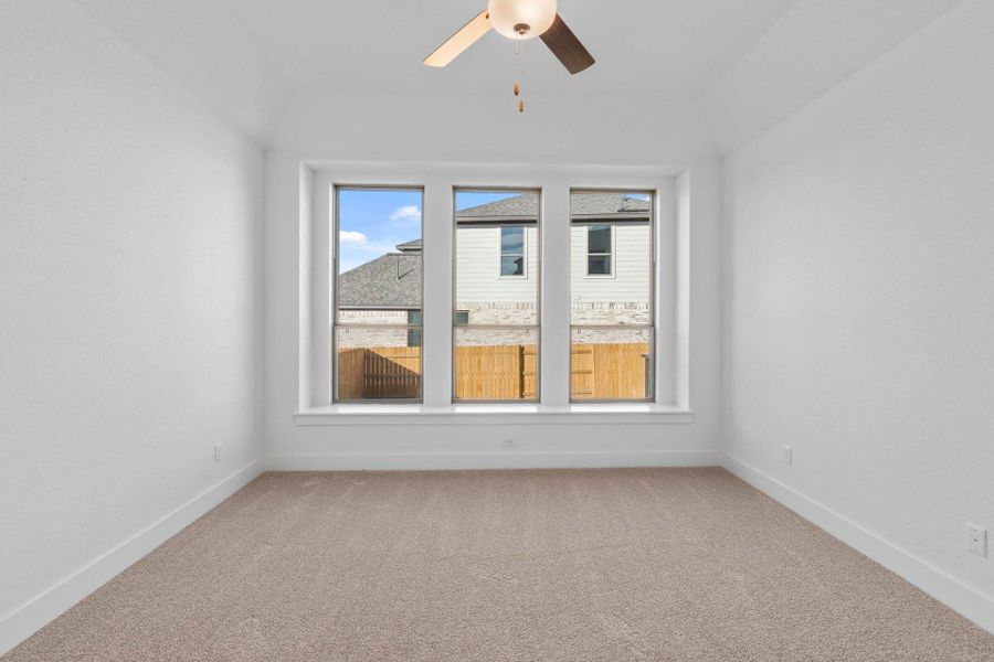 Primary Bedroom with elevated ceiling
