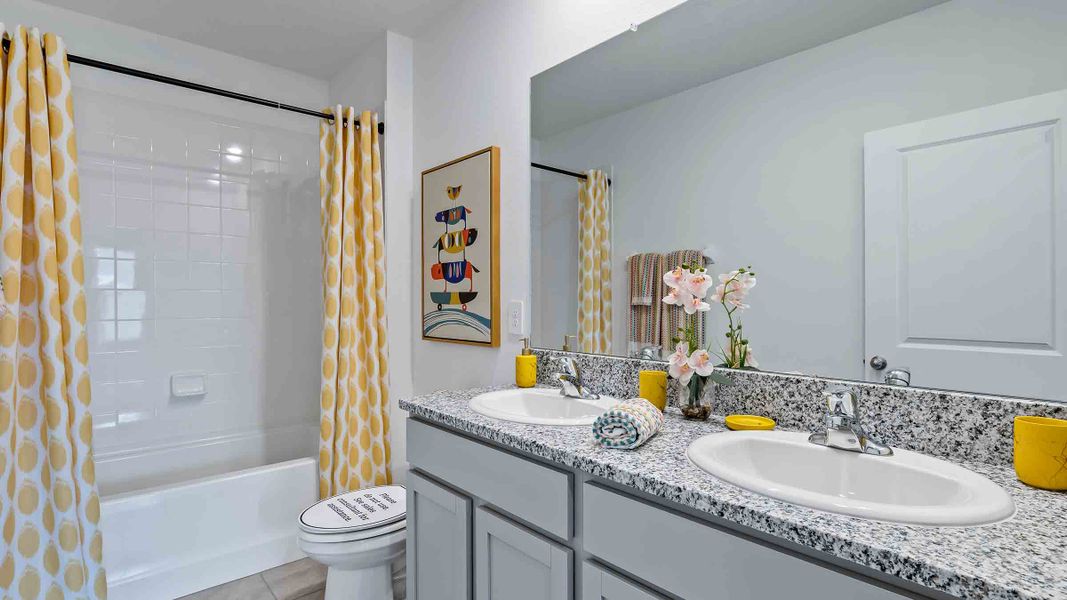 Representative furnished interior of a home built from the Robie II by D.R. Horton in Star Farms at Lakewood Ranch, Bradenton (Image 12).