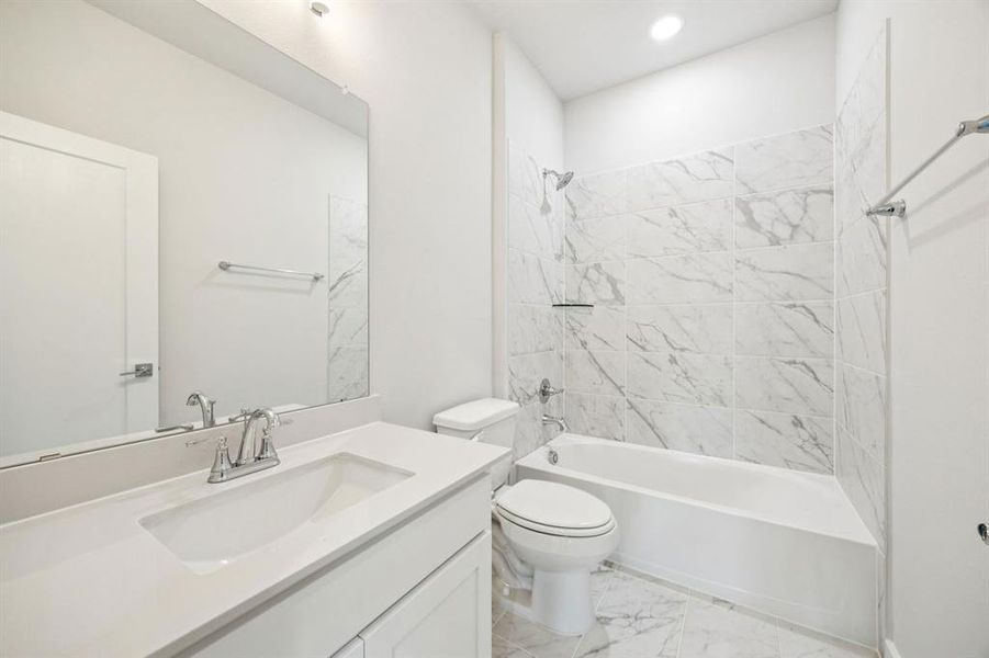 Bathroom in the Wimbledon home plan by Trophy Signature Homes – REPRESENTATIVE PHOTO Bathroom in the Wimbledon home plan by Trophy Signature Homes – REPRESENTATIVE PHOTO