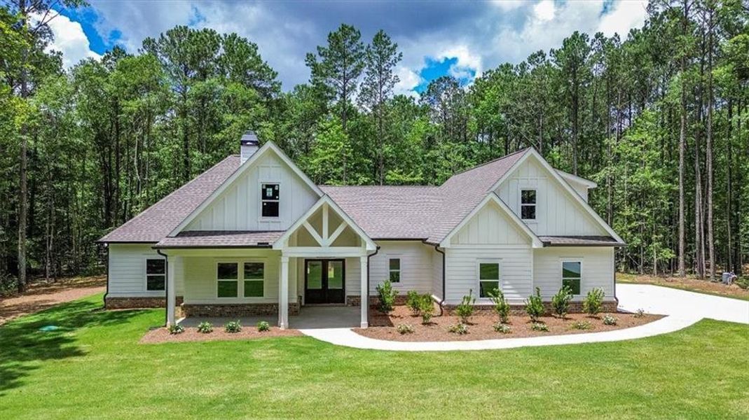 Front exterior of a new home in , Social Circle, GA, highlighting curb appeal (Image 26). Front exterior of a new home in , Social Circle, GA, highlighting curb appeal (Image 26).