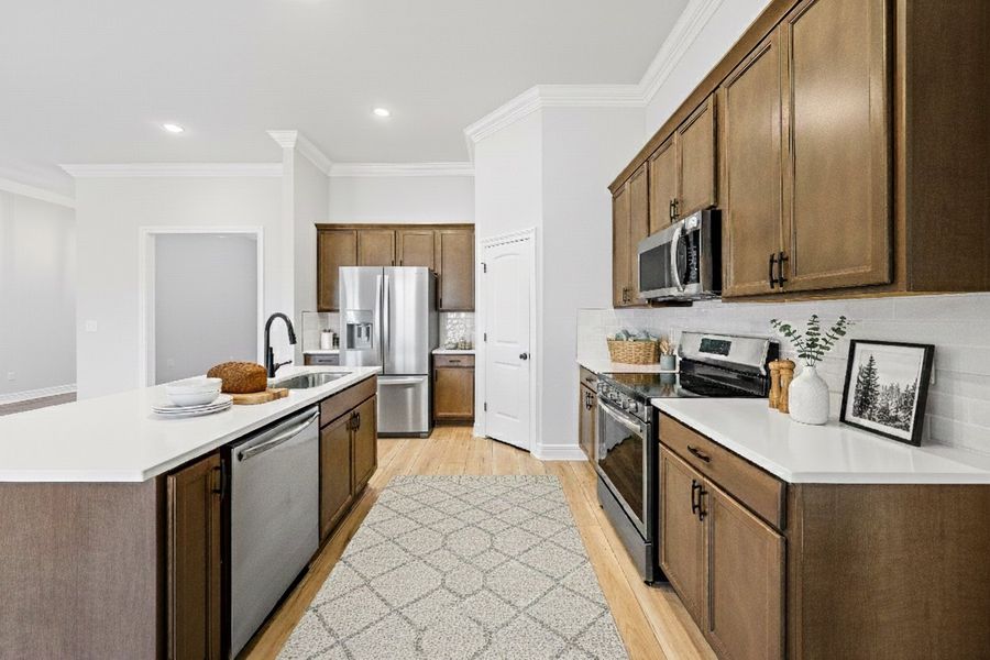 Front exterior of a new home in Young Oaks, Crestview, FL, highlighting curb appeal (Image 2).