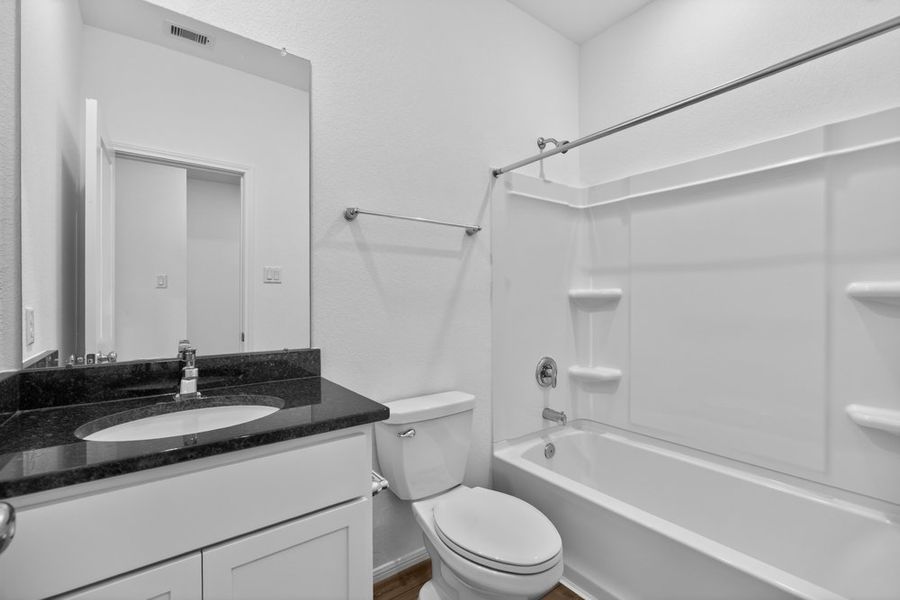 Furnished interior view inside a new home in Brookewater 45s, Rosenberg (Image 12).