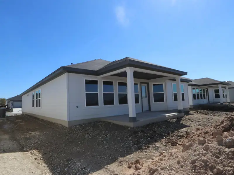 Exterior details and patio area of a home in Marble Creek Crossing, Austin (Image 2). Exterior details and patio area of a home in Marble Creek Crossing, Austin (Image 2).