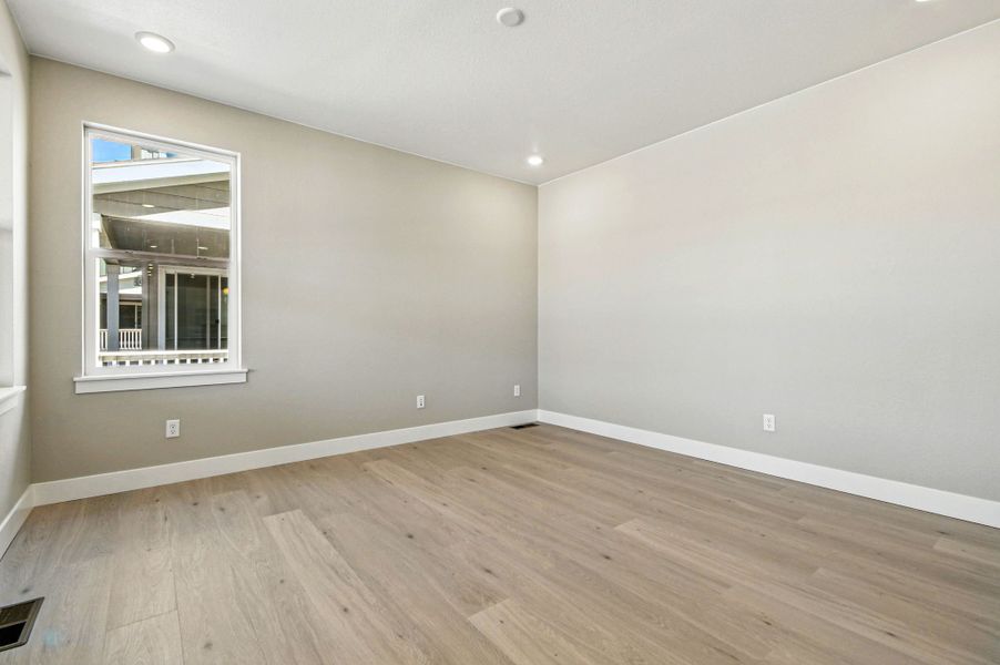 Spacious, unfurnished interior of a new home in Trailstone, Arvada (Image 24).