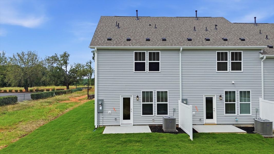 Superior curb appeal continues to the back with a refined, private backyard located in Anderson, SC
