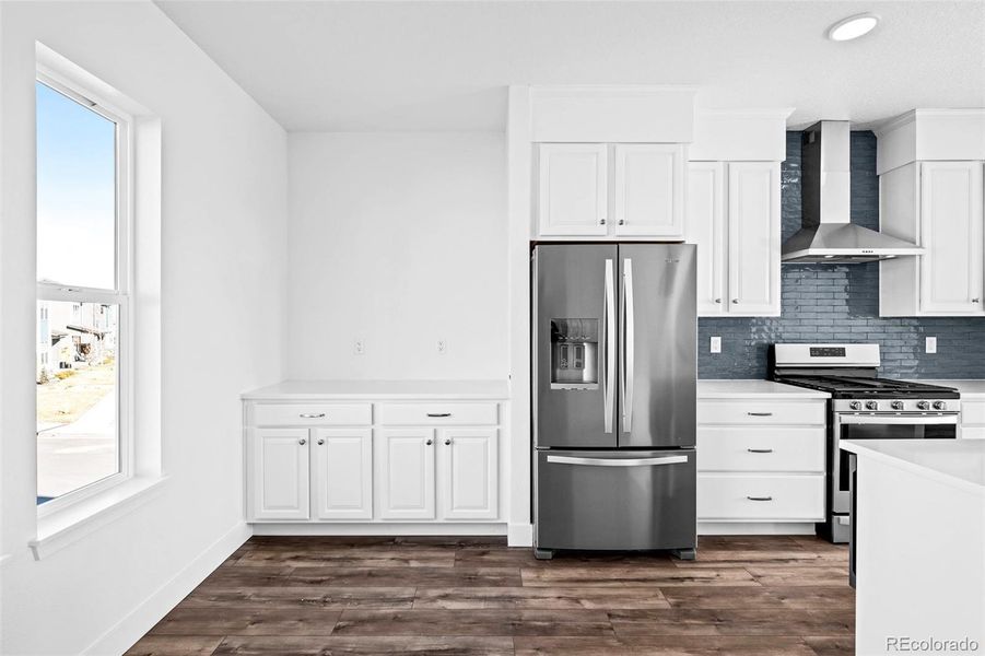 Dining area with upgraded, additional cabinets.