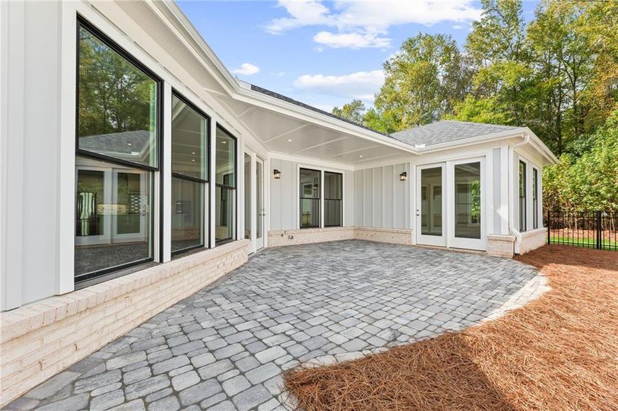 Exterior details and patio area of a home in The Courtyards by The Manor, Alpharetta (Image 4).