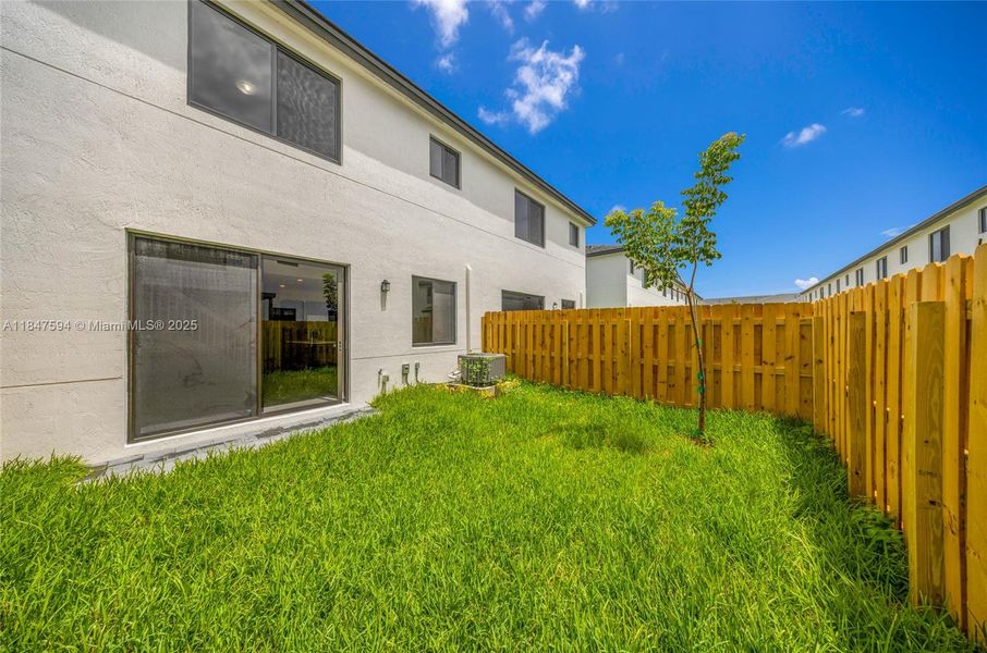 Front exterior of a new home in , Homestead, FL, highlighting curb appeal (Image 14).