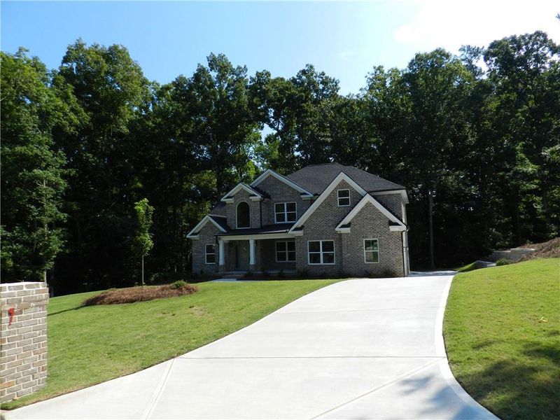 Front exterior of a new home in , McDonough, GA, highlighting curb appeal (Image 19).