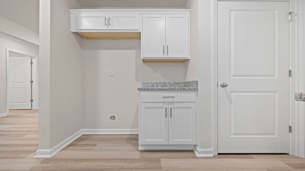 Spacious, unfurnished interior of a new home in Bentley Park, Greenwood (Image 19).