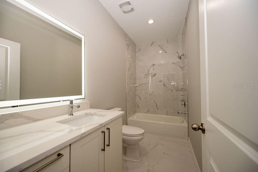 Furnished interior view inside a new home in , Deland (Image 12).