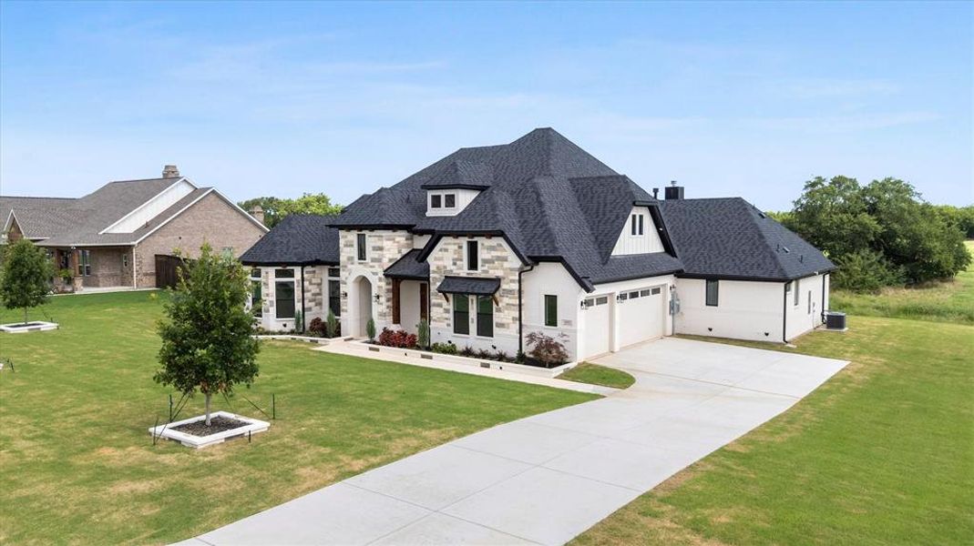 Front exterior of a new home in , Midlothian, TX, highlighting curb appeal (Image 20). Front exterior of a new home in , Midlothian, TX, highlighting curb appeal (Image 20).