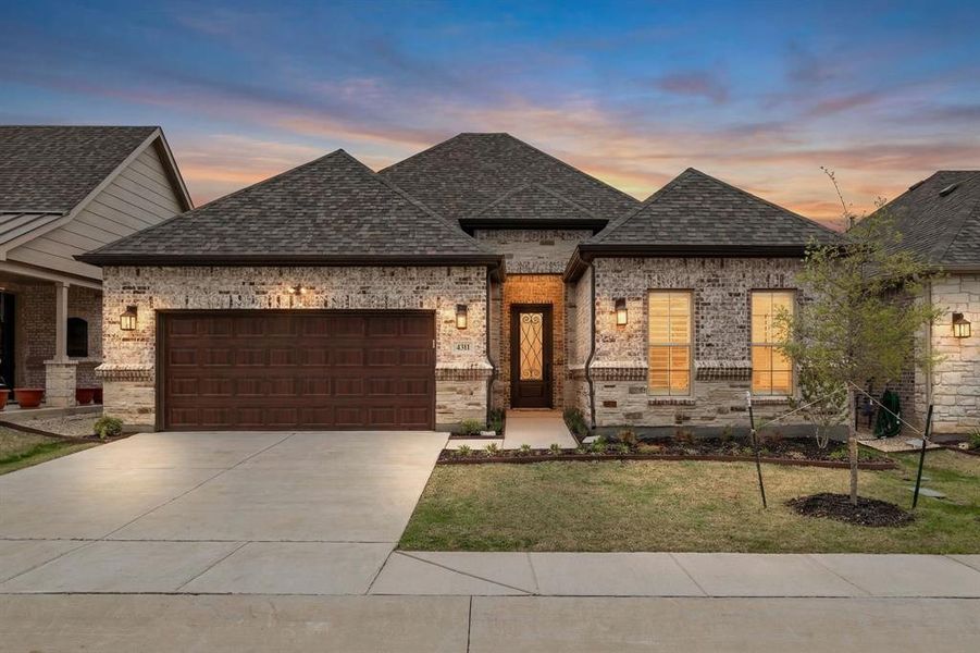 Front exterior of a new home in , Prosper, TX, highlighting curb appeal (Image 1). Front exterior of a new home in , Prosper, TX, highlighting curb appeal (Image 1).