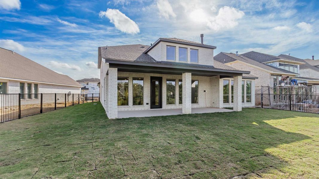 Exterior details and patio area of a home in Bridgeland, Cypress (Image 2).