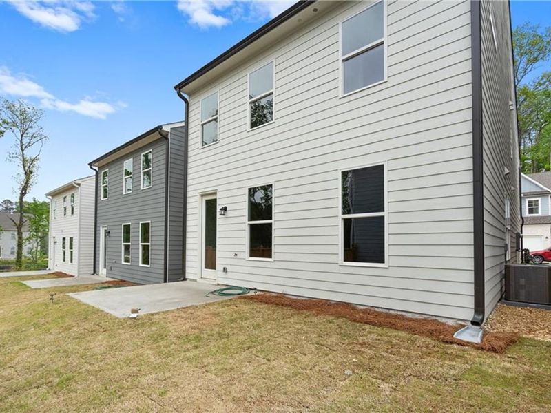 Exterior details and patio area of a home in The Village at Shallowford, Kennesaw (Image 17).