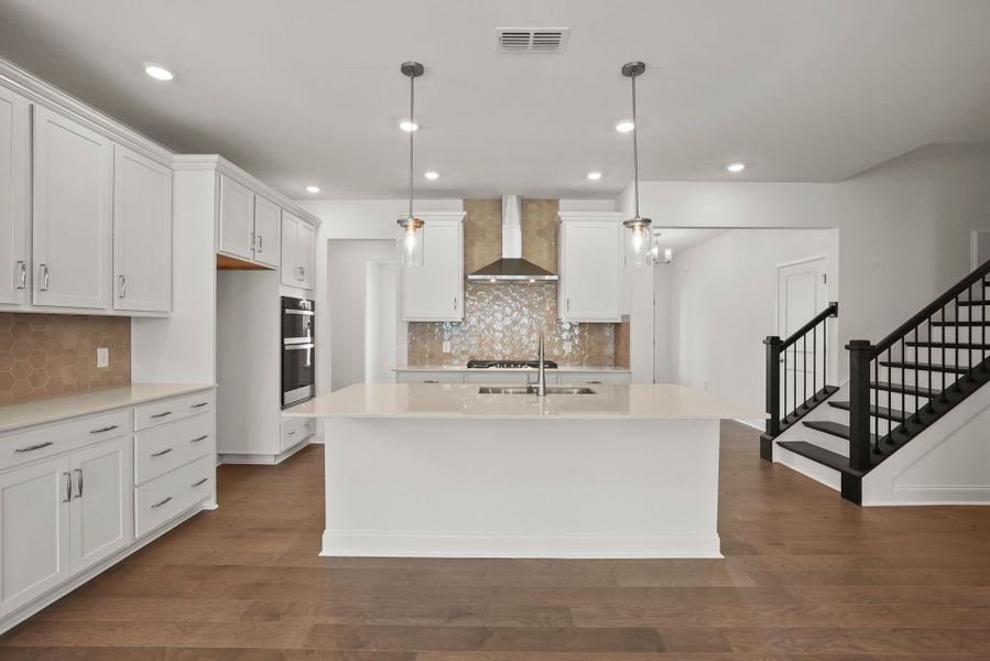 Spacious Kitchen with an Island Spacious Kitchen with an Island