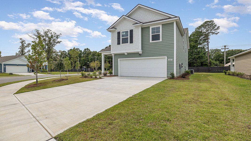 Representative exterior photo of a completed home built from the Wren by D.R. Horton in The Bluffs at Mill Creek, Florence, SC (Image 23).