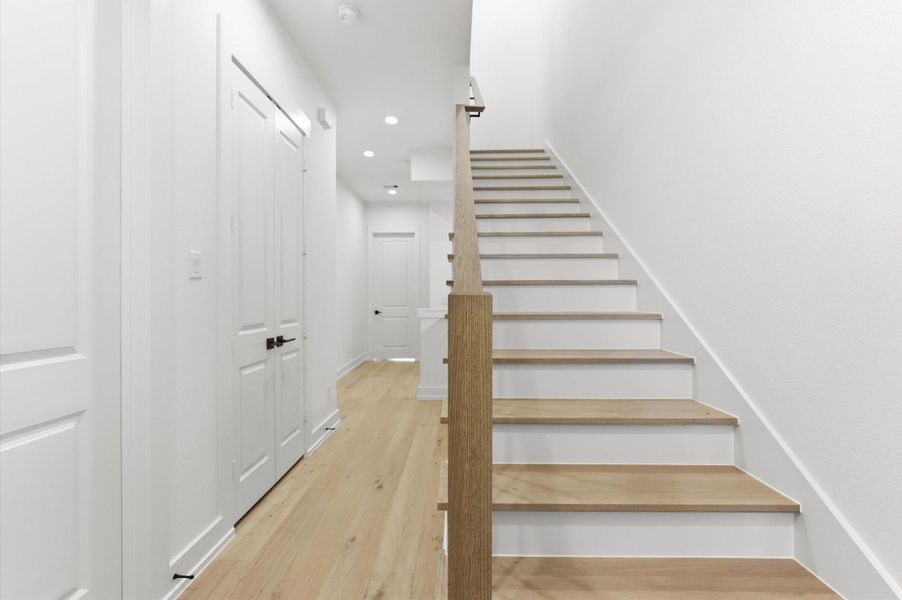 Stairs leading up to third floor