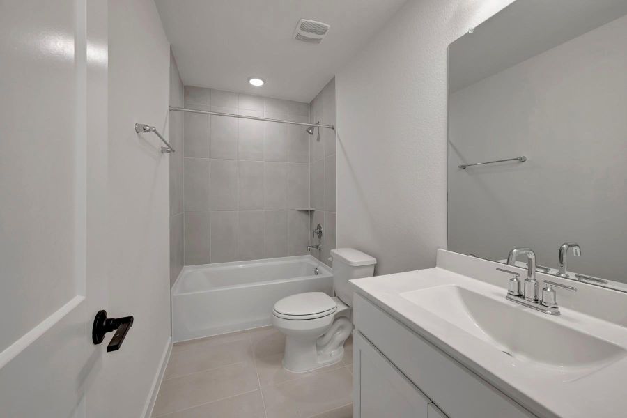 Furnished interior view inside a new home in Sorella, Tomball (Image 10).