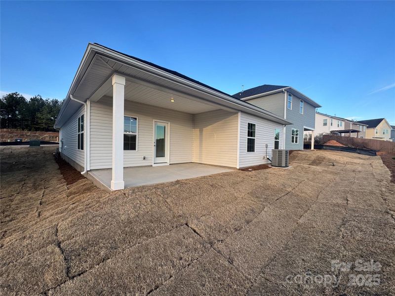 Exterior details and patio area of a home in Village at Parkside, Gastonia (Image 3).