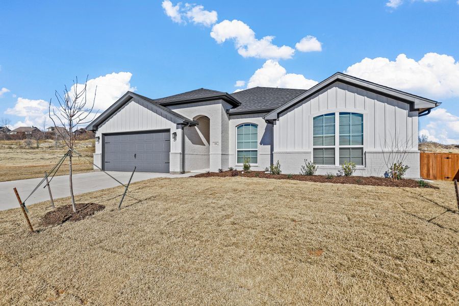 Representative exterior photo of a completed home built from the Iverson I by Cheldan Homes in Terra Vista, Springtown, TX (Image 34). Representative exterior photo of a completed home built from the Iverson I by Cheldan Homes in Terra Vista, Springtown, TX (Image 34).