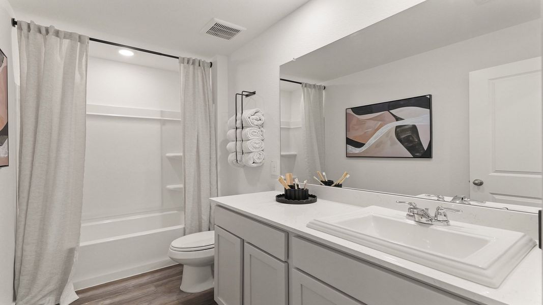 Furnished interior view inside a new home in Cypress Green, Tomball (Image 34).