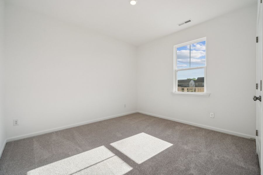 Representative unfurnished interior of a home built from the Madison Premier by Taylor Morrison in Stafford at Langtree, Mooresville (Image 26).