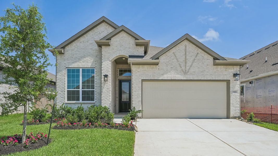 Representative exterior photo of a completed home built from the Rowan by Chesmar Homes in Briarwood, Elgin, TX (Image 19). Representative exterior photo of a completed home built from the Rowan by Chesmar Homes in Briarwood, Elgin, TX (Image 19).
