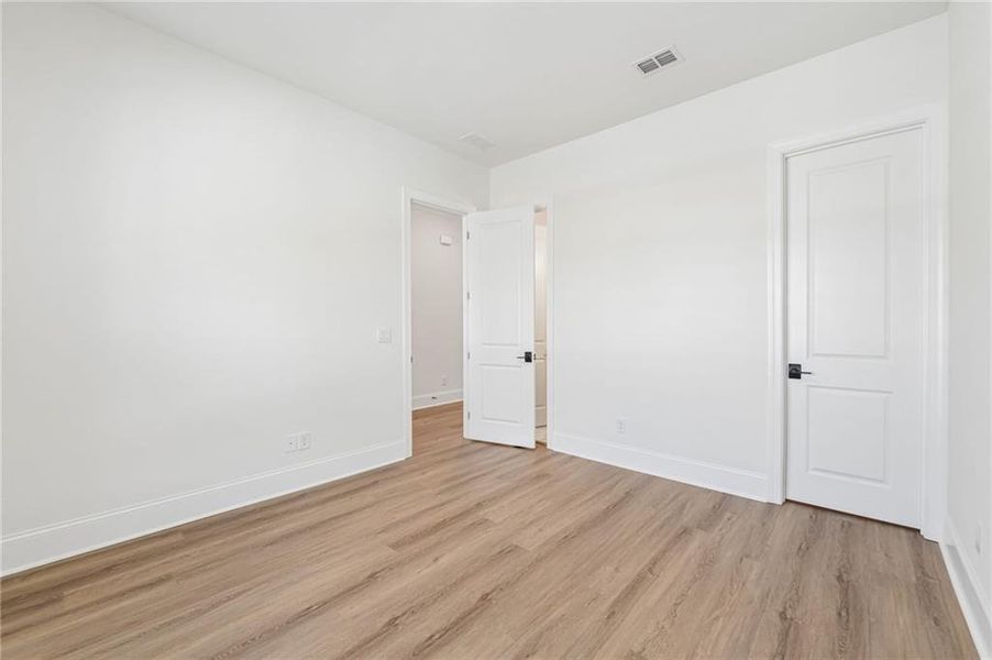 Spacious, unfurnished interior of a new home in Waterhaven, Cumming (Image 34).