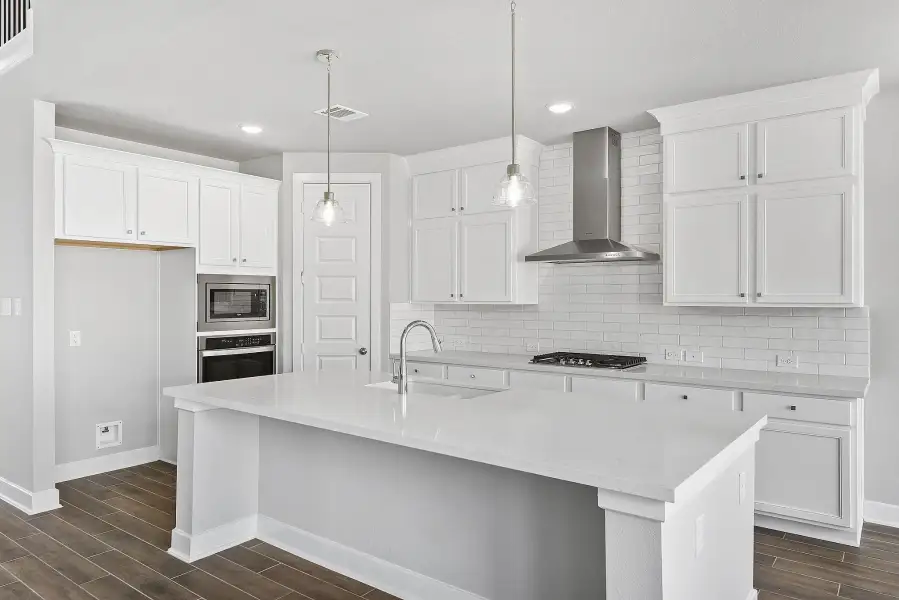 Furnished interior view inside a new home in Grand Central Park, Conroe (Image 7).