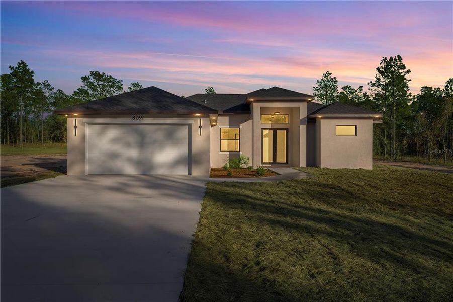 Front exterior of a new home in , Dunnellon, FL, highlighting curb appeal (Image 17).