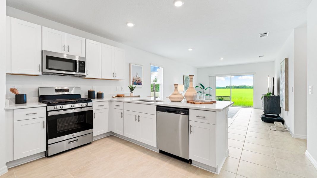 Representative furnished interior of a home built from the Seneca by Taylor Morrison in Palm Wind, Hudson (Image 4).