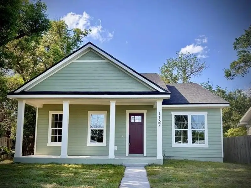 Front exterior of a new home in , Lakeland, FL, highlighting curb appeal (Image 19).