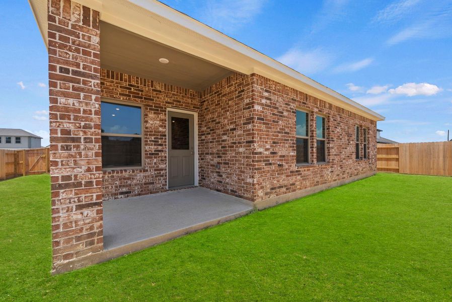 Exterior details and patio area of a home in Windcress, Cove (Image 3).
