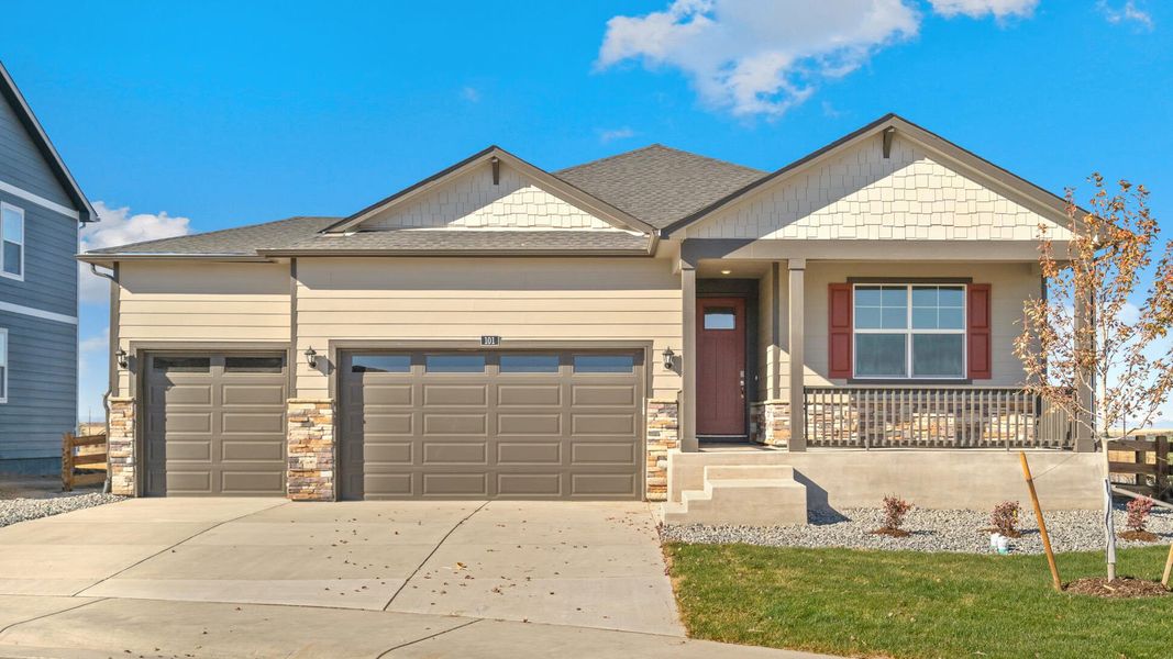 Front exterior of a new home in Hansen Farm, Fort Collins, CO, highlighting curb appeal (Image 1).