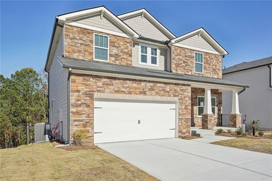 Front exterior of a new home in Ivey Township, Dallas, GA, highlighting curb appeal (Image 26).