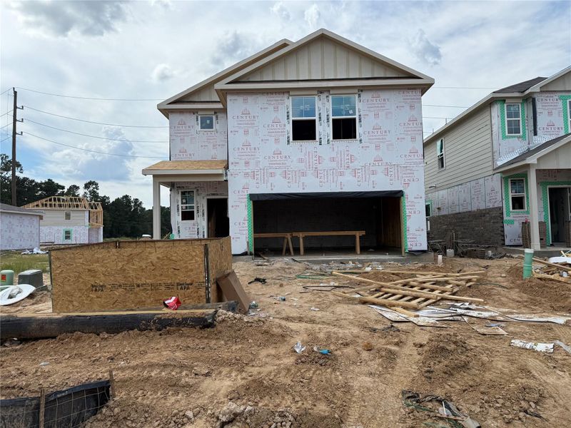 In-progress construction of a new home in Lakes at Black Oak, Magnolia, TX (Image 26).
