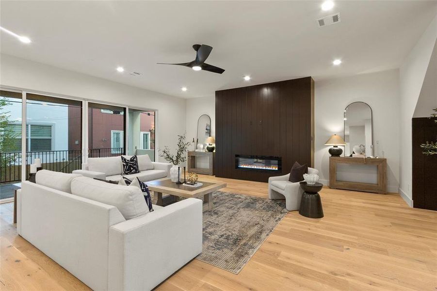 Living room with beautiful accent wall and fire place