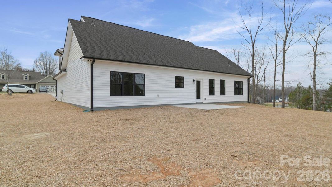 Exterior details and patio area of a home in , Oakboro (Image 3).