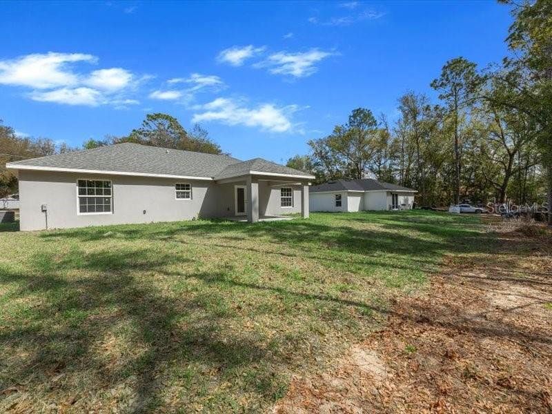 Exterior details and patio area of a home in , Ocala (Image 22).