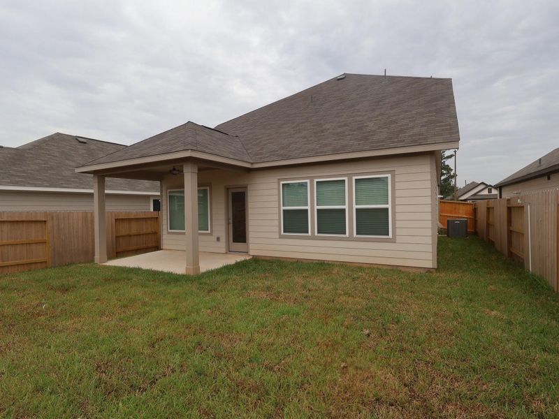 Exterior details and patio area of a home in Lone Star Landing, Montgomery (Image 4).