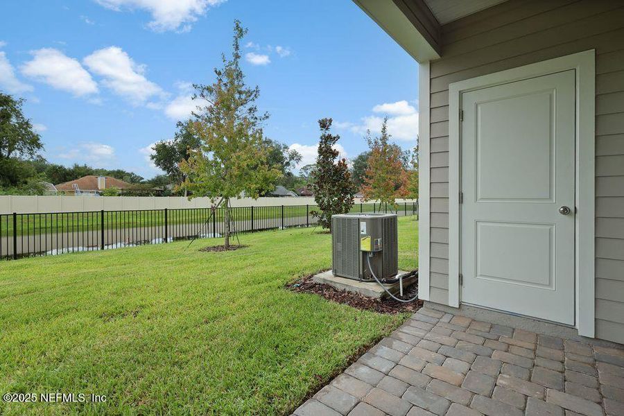 Front exterior of a new home in Sabal Terrace, Jacksonville, FL, highlighting curb appeal (Image 20).