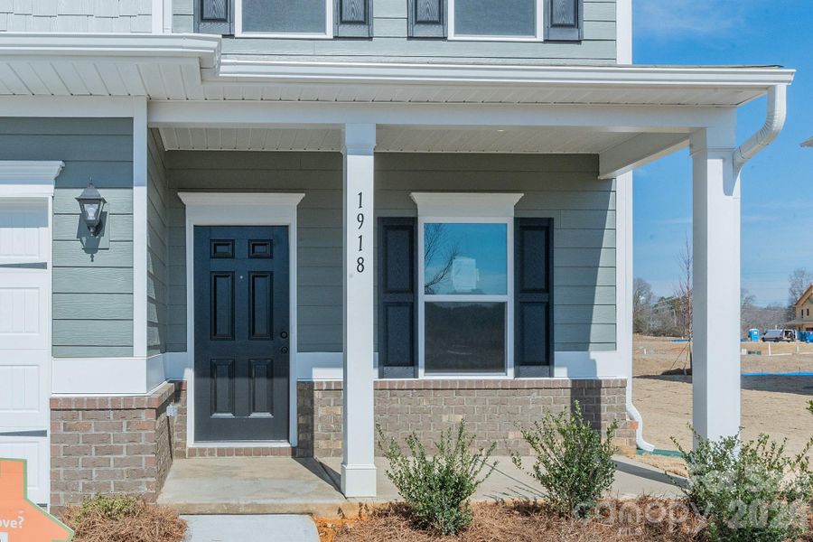 Exterior details and patio area of a home in Cedar Meadows, Monroe (Image 18).