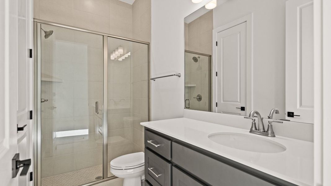 Furnished interior view inside a new home in Glynlea Country Club, Port St. Lucie (Image 9).