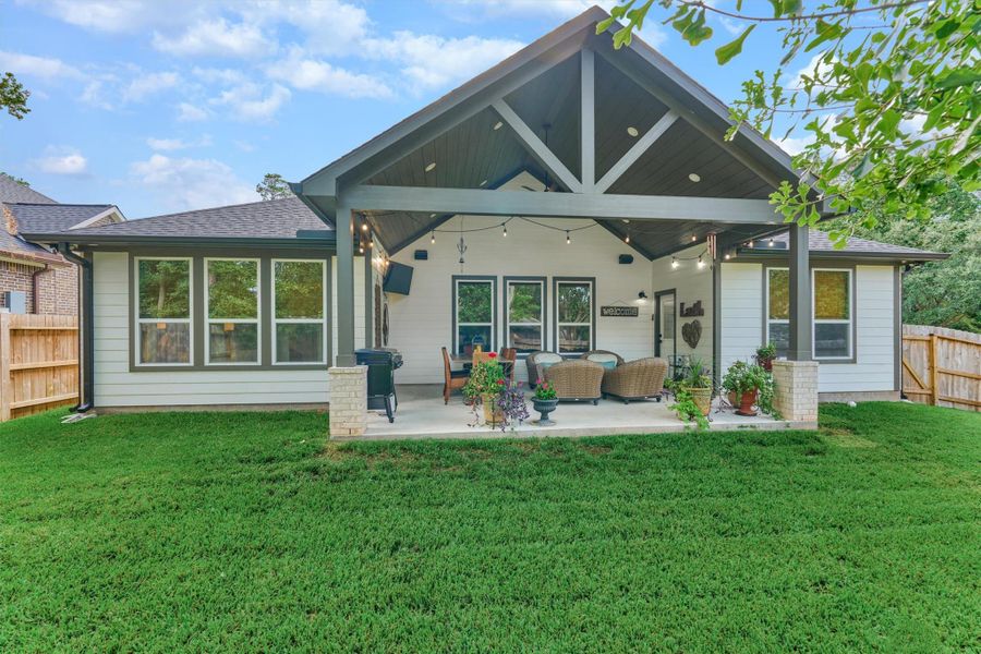The expansive covered patio, with it's vaulted ceiling, recessed lighting and wood accents offer the ideal setting. The expansive covered patio, with it's vaulted ceiling, recessed lighting and wood accents offer the ideal setting.
