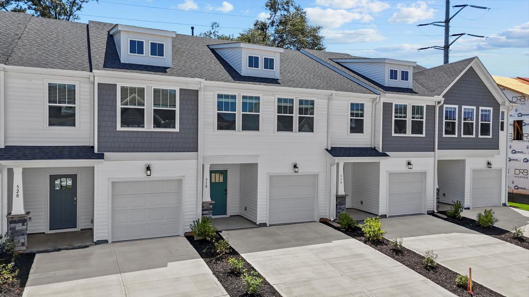 Front exterior of a new home in Hickory Heights, Greenville, SC, highlighting curb appeal (Image 2). Front exterior of a new home in Hickory Heights, Greenville, SC, highlighting curb appeal (Image 2).