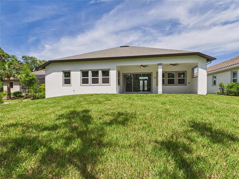 Exterior details and patio area of a home in , Palm Coast (Image 29).