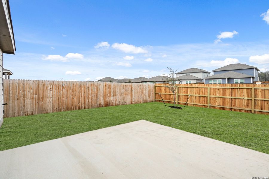 Exterior details and patio area of a home in Abbott Place, St. Hedwig (Image 17).