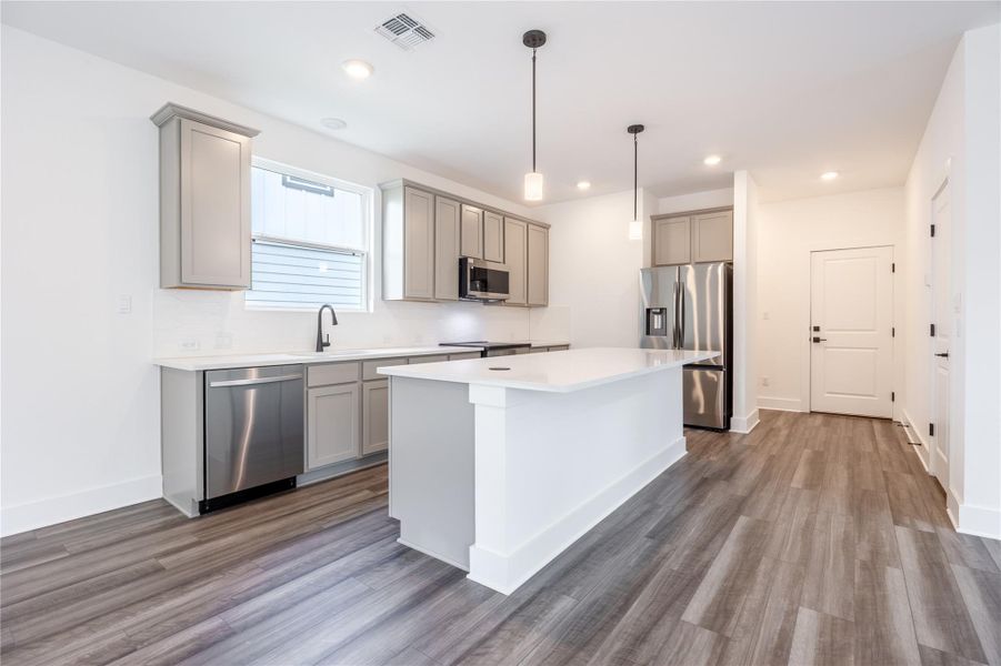 Furnished interior view inside a new home in Ryegrass Collection – Freedom at Anthem, Kyle (Image 9).
