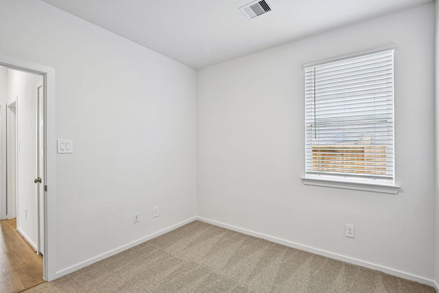 Spacious, unfurnished interior of a new home in Riviera Pines - Premier Series, Huffman (Image 39).